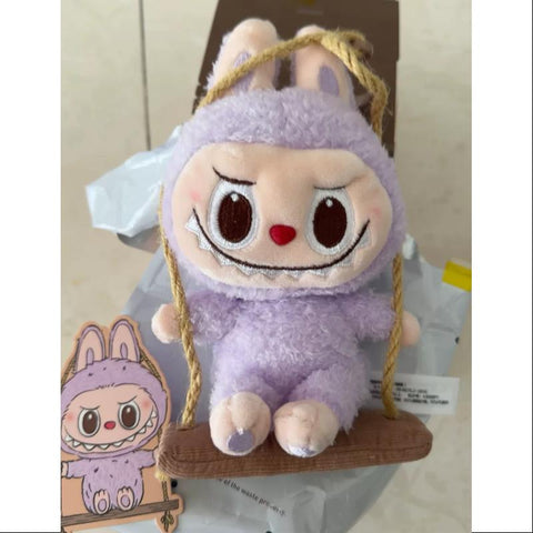Labubu POP LAND TIMBER WORKSHOP PLAYING ON THE SWING PLUSH PENDANT Series Purple Labubu POP LAND TIMBER WORKSHOP PLAYING ON THE SWING PLUSH PENDANT Series Purple