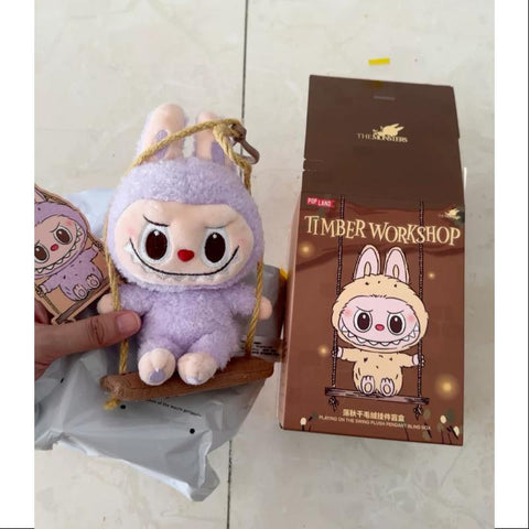 Labubu POP LAND TIMBER WORKSHOP PLAYING ON THE SWING PLUSH PENDANT Series Purple Labubu POP LAND TIMBER WORKSHOP PLAYING ON THE SWING PLUSH PENDANT Series Purple