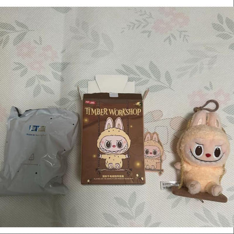 Labubu POP LAND TIMBER WORKSHOP PLAYING ON THE SWING PLUSH PENDANT Series Yellow Labubu POP LAND TIMBER WORKSHOP PLAYING ON THE SWING PLUSH PENDANT Series Yellow