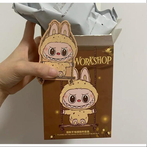 Labubu POP LAND TIMBER WORKSHOP PLAYING ON THE SWING PLUSH PENDANT Series Yellow Labubu POP LAND TIMBER WORKSHOP PLAYING ON THE SWING PLUSH PENDANT Series Yellow