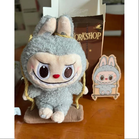 Labubu POP LAND TIMBER WORKSHOP PLAYING ON THE SWING PLUSH PENDANT Series Grey Labubu POP LAND TIMBER WORKSHOP PLAYING ON THE SWING PLUSH PENDANT Series Grey